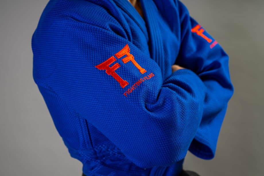 Judogi fighting films bleu zoom logo